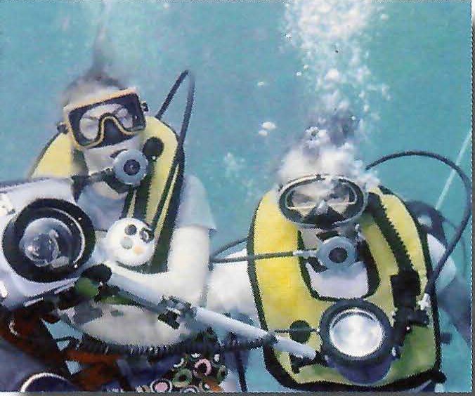 Morton and Alese Pechter diving with underwater cameras