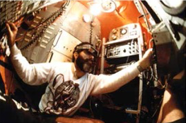 Emory Kristof working inside an underwater vehicle