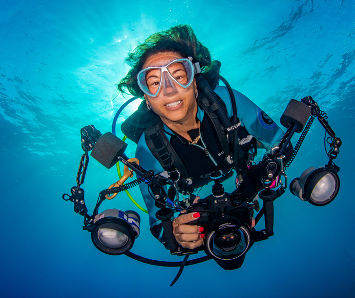 Margo Peyton underwater with camera equipment