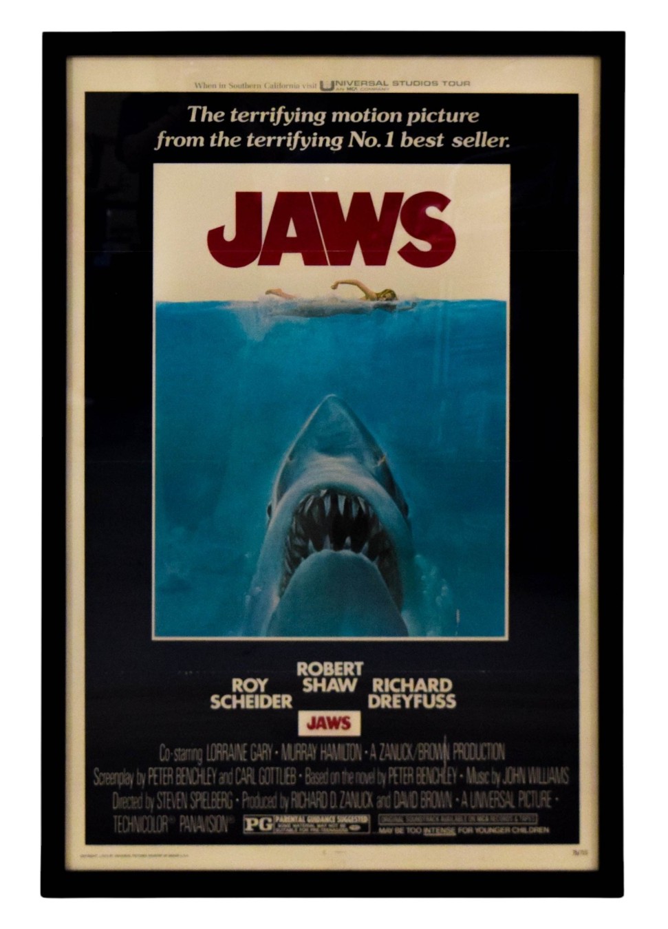 A framed 1975 Jaws movie poster from Peter Benchley’s collection.